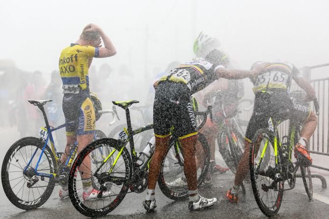Riders cool down thanks to a water spray