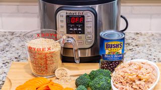 Instant Pot with food around it