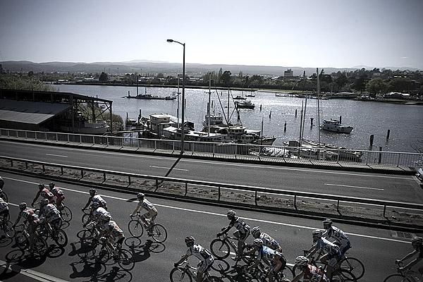 The peloton cross the Tamar River as they leave Launceston on stage eight of the Tour.