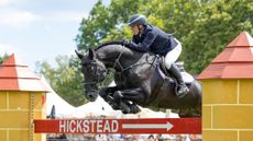 Robert Whitaker and Vermento clear the Hickstead planks