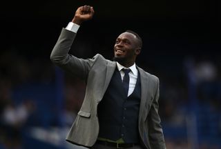 Usain Bolt of Soccer Aid World XI walks on the pitch prior to the Soccer Aid for UNICEF 2019 match between England and the Soccer Aid World XI at Stamford Bridge on June 16, 2019 in London, England