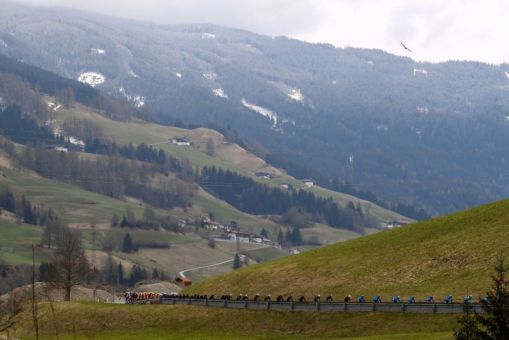 INNSBRUCK AUSTRIA APRIL 19 The peloton during the 44th Tour of the Alps 2021 Stage 1 a 1406km stage from Brixen to Innsbruck Snow Landscape TourofTheAlps TouroftheAlps on April 19 2021 in Innsbruck Austria Photo by Tim de WaeleGetty Images