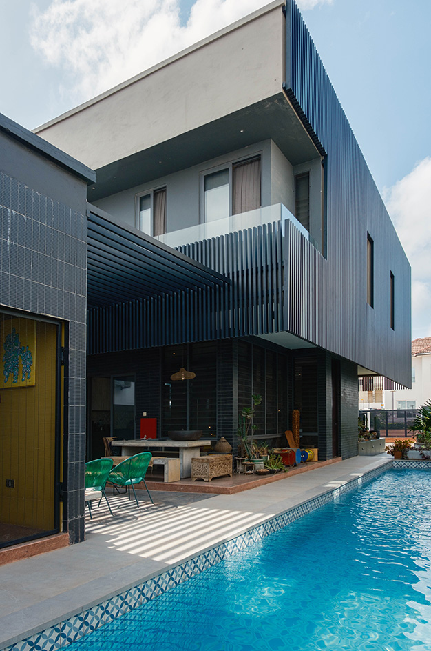 Compact House in Ghana, showing modern interiors and shades in a small but expansive-feeling space