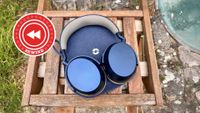 Sennheiser Momentum 5 on table with Rewind logo