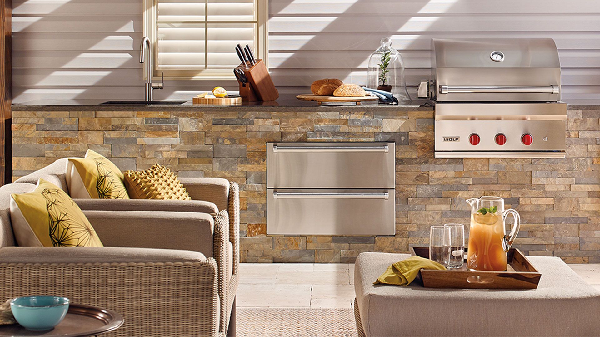 Outdoor kitchen ideas with tiled kitchen and stainless steel oven and grill