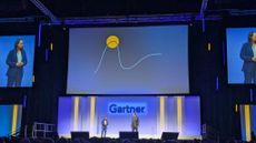 Christine Lee, VP research at Gartner and Leigh McMullen, distinguished VP analyst at Gartner onstage at Gartner Security & Risk Management Summit in London, stood beneath a large screen showing a Gartner hype cycle diagram.