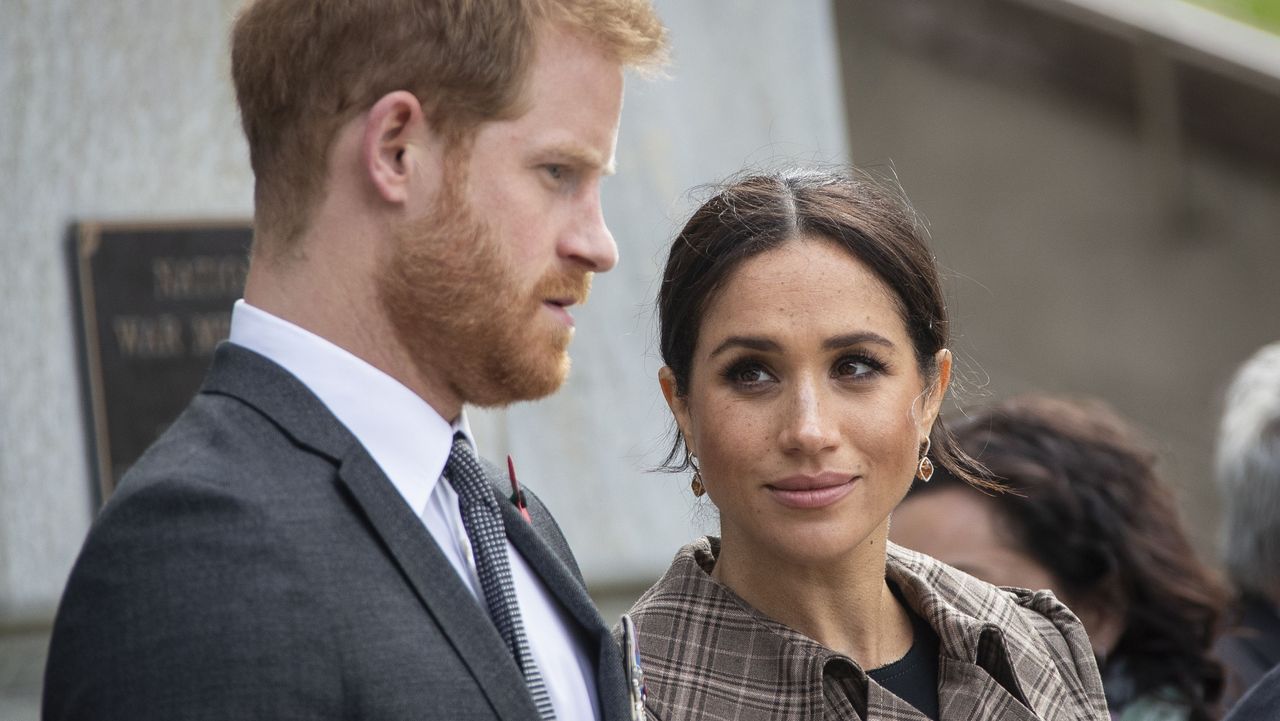 wellington, nz october 28 prince harry, duke of sussex and meghan, duchess of sussex lay ferns and a wreath at the tomb of the unknown warrior at the newly unveiled uk war memorial and pukeahu national war memorial park, on october 28, 2018, in wellington, new zealand the duke and duchess of sussex are on their official 16 day autumn tour visiting cities in australia, fiji, tonga and new zealand photo by rosa woods poolgetty images