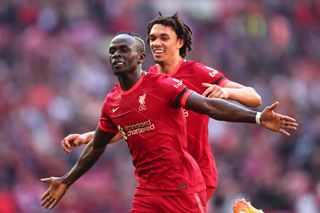 Sadio Mane celebrates with Trent Alexander-Arnold after scoring for Liverpool against Manchester City in the FA Cup semi-finals in April 2022.