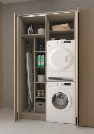 Small utility room ideas showing practical shelving to store an ironing board, household items, and laundry appliances