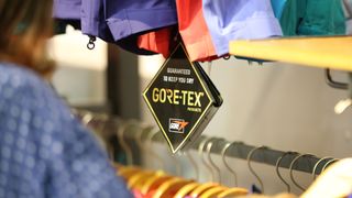 A gore-tex label hanging from clothing in an outdoor store