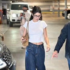 An image of Kendall Jenner wearing the cuffed jean trend.
