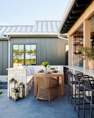 An outdoor deck with built in seating