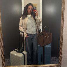 sierra mayhew wearing an airplane outfit
