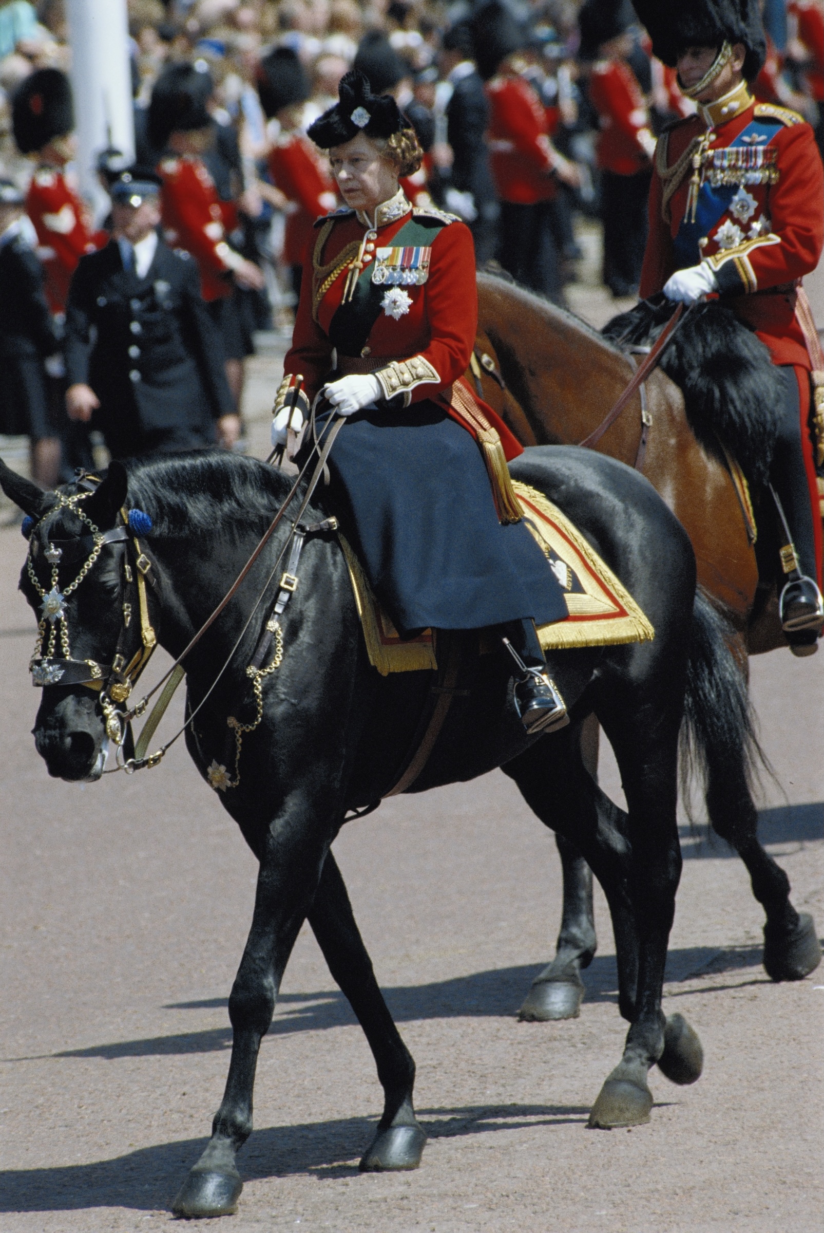 Queen Elizabeth riding her horse Burmese side saddle in 1986