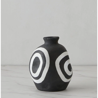 black stoneware vase with white ringed pattern