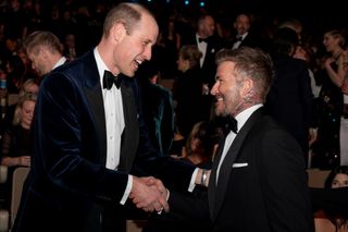 Prince William chats with David Beckham at the 2024 BAFTAs.