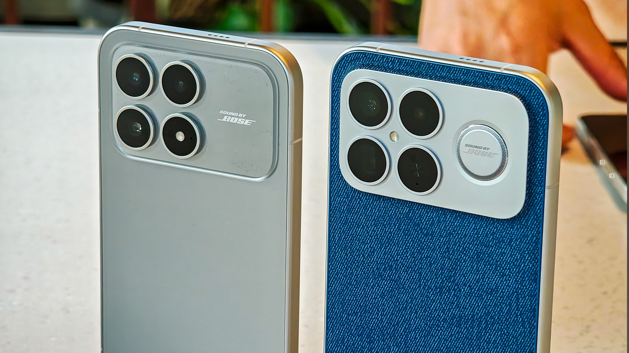 Poco F8 Pro in the hand in silver