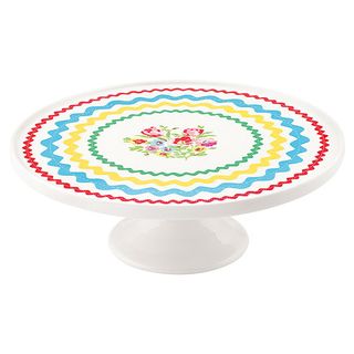 cake stand with floral and white background