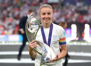 Leah Williamson of England lifts the UEFA Women's EURO 2022 Trophy after their side's victory during the UEFA Women's Euro 2022 final match between England and Germany at Wembley Stadium on July 31, 2022 in London, England.