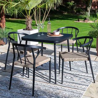 black dining table and chair set for gardens