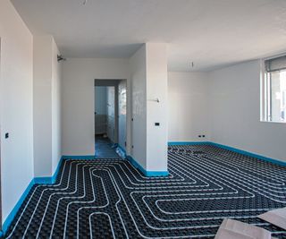 wet underfloor heating laid in newly built room