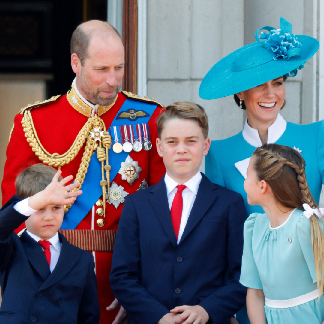 Prince William and Princess Kate on the balcony waving with Prince George, Prince Louis and Princess Charlotte