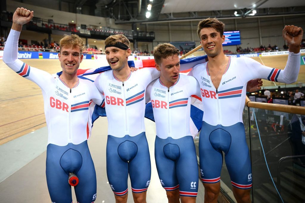 British team riders Ethan Hayter 2nd R Oliver Wood L Ethan Vernon R and Daniel Bigham 2nd L celebrate winning the Mens Team Pursuit finals during the UCI Track Cycling World Championships at the Velodrome of SaintQuentinenYvelines southwest of Paris on October 13 2022 Photo by AnneChristine POUJOULAT AFP Photo by ANNECHRISTINE POUJOULATAFP via Getty Images