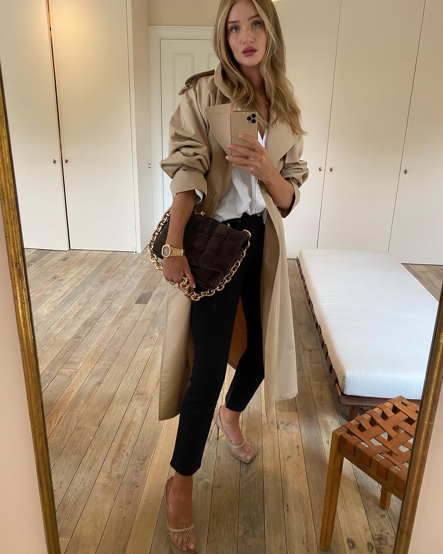 An image of @rosiehw wearing a Patek Philippe Nautilus, one of the best luxury watches for women, in 2020.