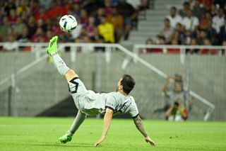 Lionel Messi scores an overhead kick for Paris Saint-Germain against Clermont Foot in August 2022.