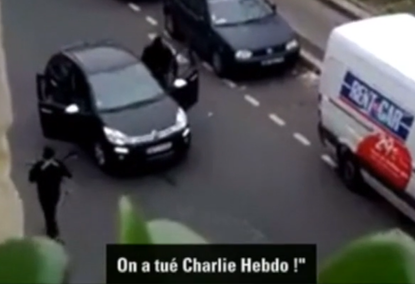 Amateur footage reportedly shows masked gunmen fleeing the Charlie Hebdo headquarters