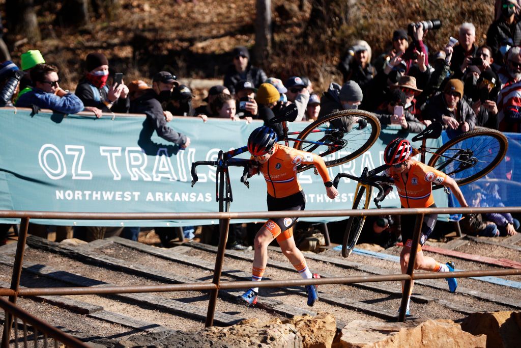 FAYETTEVILLE ARKANSAS JANUARY 29 LR Lucinda Brand of Netherlands and Marianne Vos of Netherlands compete while fans cheer 73rd UCI CycloCross World Championships Fayetteville 2022 Womens Elite Fayetteville2022 on January 29 2022 in Fayetteville Arkansas Photo by Chris GraythenGetty Images