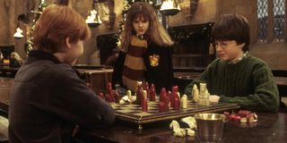 Rupert Grint, Emma Watson, and Daniel Radcliffe in Harry Potter and the Sorcerer's Stone