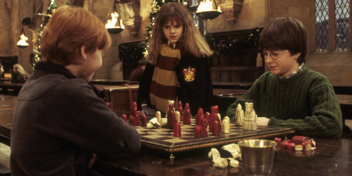 Rupert Grint, Emma Watson, and Daniel Radcliffe in Harry Potter and the Sorcerer&#039;s Stone