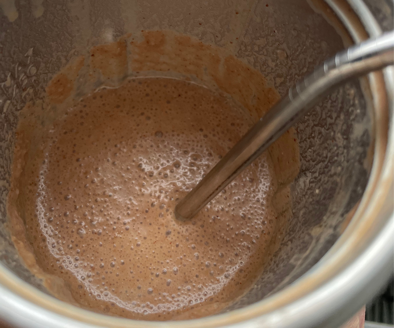 A frothy, coffee shake in the nutribullet Flip&trade; Insulated Portable Blender