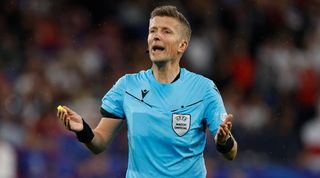 Who is the referee and VAR for Portugal vs Slovenia as the Group F winners Group C's third place side? Italian referee Daniele Orsato during the Euro 2024 match between Serbia and England in June 2024.