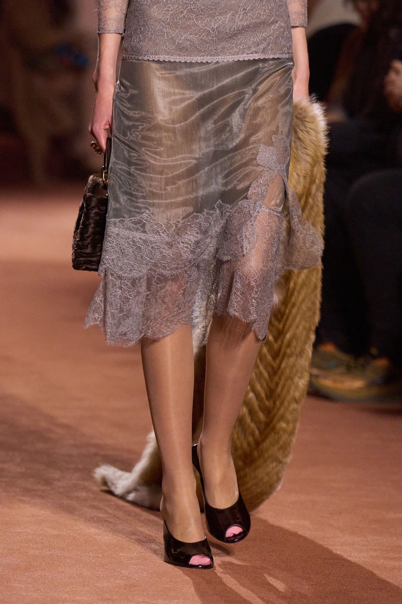 Woman in peep-toe shoes on the Fendi runway