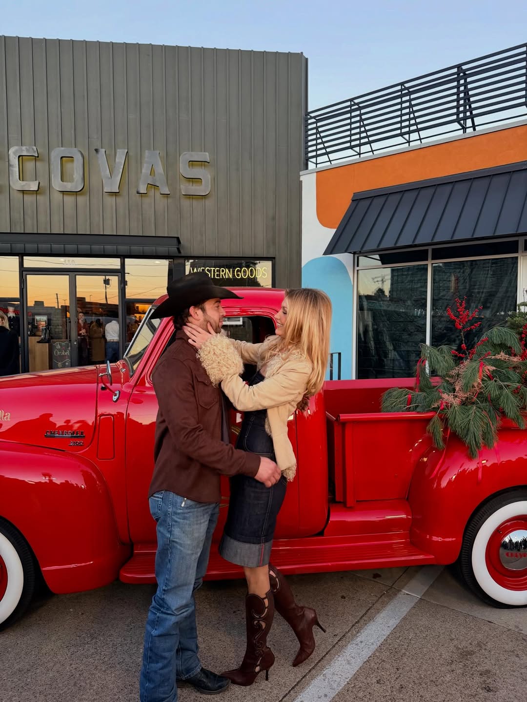 Bella Hadid attended an Orebella event wearing a denim midi dress, cowboy boots, and a cropped Penny Lane coat