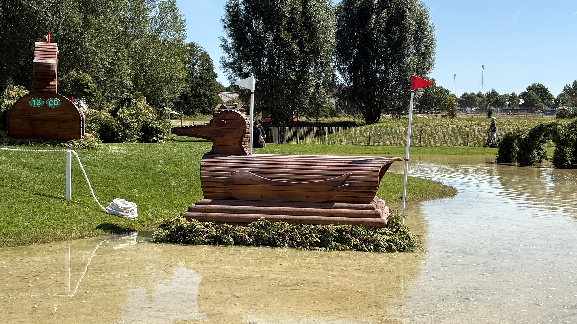 A wooden duck in water on the eventing World Championships cross-country course
