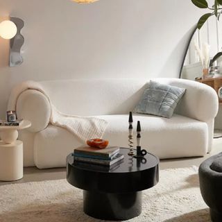 A cream boucle sofa