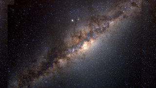 A view of the disk of the Milky Way surrounded by our galaxy's halo which could be home to three surprisingly ancient stars