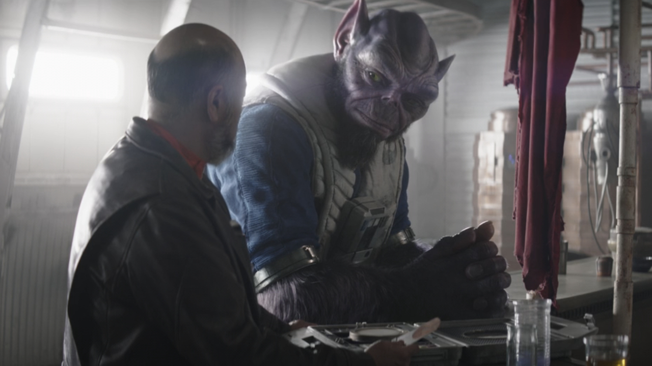 Carson Teva (Paul Sun-Hyung Lee) and Zeb Orrelios (Steve Blum) talk on The Mandalorian.