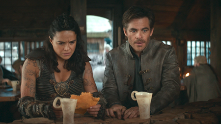 Michelle Rodriguez and Chris Pine in a tavern in Dungeons & Dragons: Honor Among Thieves