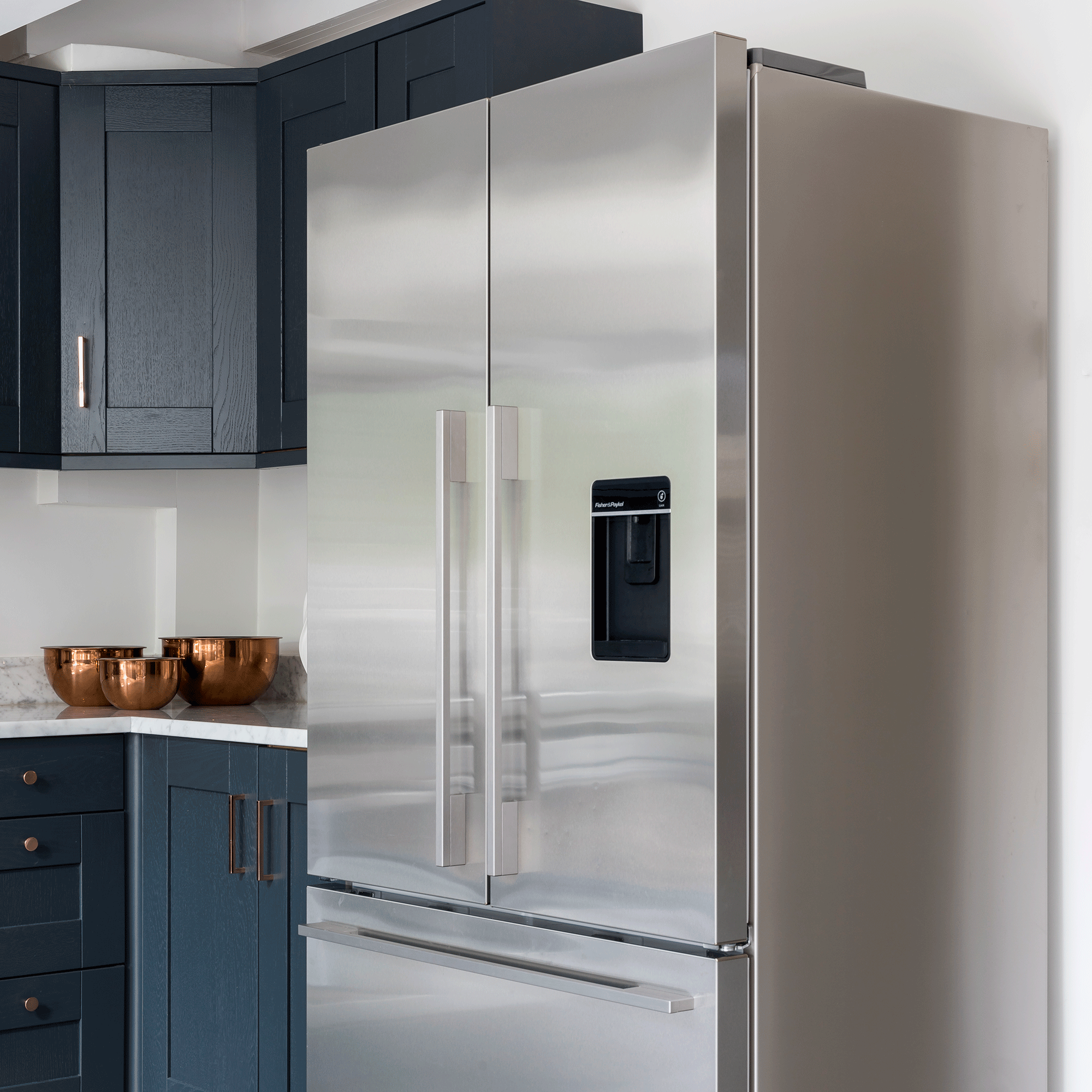 Silver fridge freezer in a kitchen 