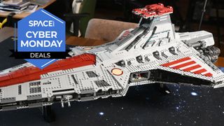 A Lego Star Wars UCS Venator, built, on a table.
