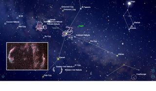 The Milky Way passes through the constellation Cygnus, the swan. As a result, that region of the sky is filled with beautiful star clusters and nebulas. The North American Nebula and the adjacent Pelican Nebula can be seen using binoculars under very dark skies. The Veil Nebula is an enormous, tattered ring of glowing gas situated below the naked-eye star Gienah. The object, actually the remains of a long-ago supernova explosion, is five full moon diameters across!