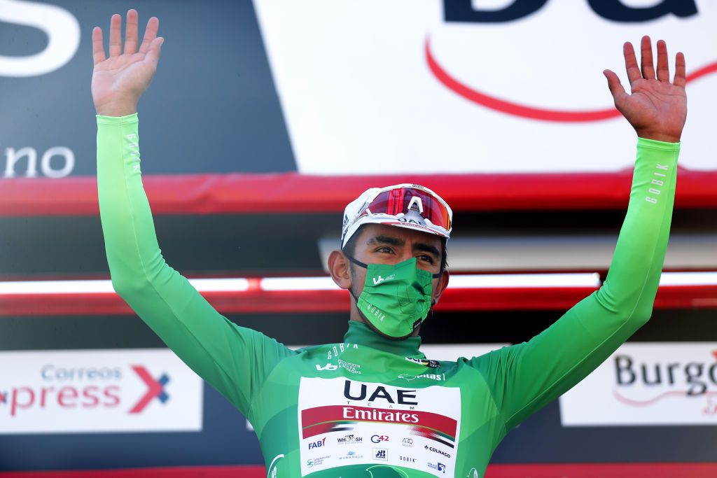ARANDA DE DUERO SPAIN AUGUST 06 Juan Sebastin Molano Benavides of Colombia and UAE Team Emirates Green Points Jersey celebrates at podium during the 43rd Vuelta a Burgos 2021 Stage 4 a 149km stage from Roa to Aranda de Duero VueltaBurgos BurgosCycling CapitalMundialdelCiclismo on August 06 2021 in Aranda de Duero Spain Photo by Gonzalo Arroyo MorenoGetty Images
