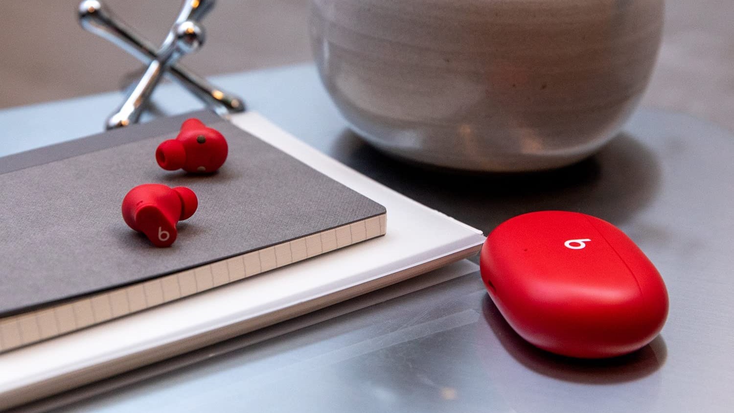 Beats earbuds on table