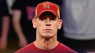 John Cena looking dead faced in the ring on Monday Night Raw in Brussels