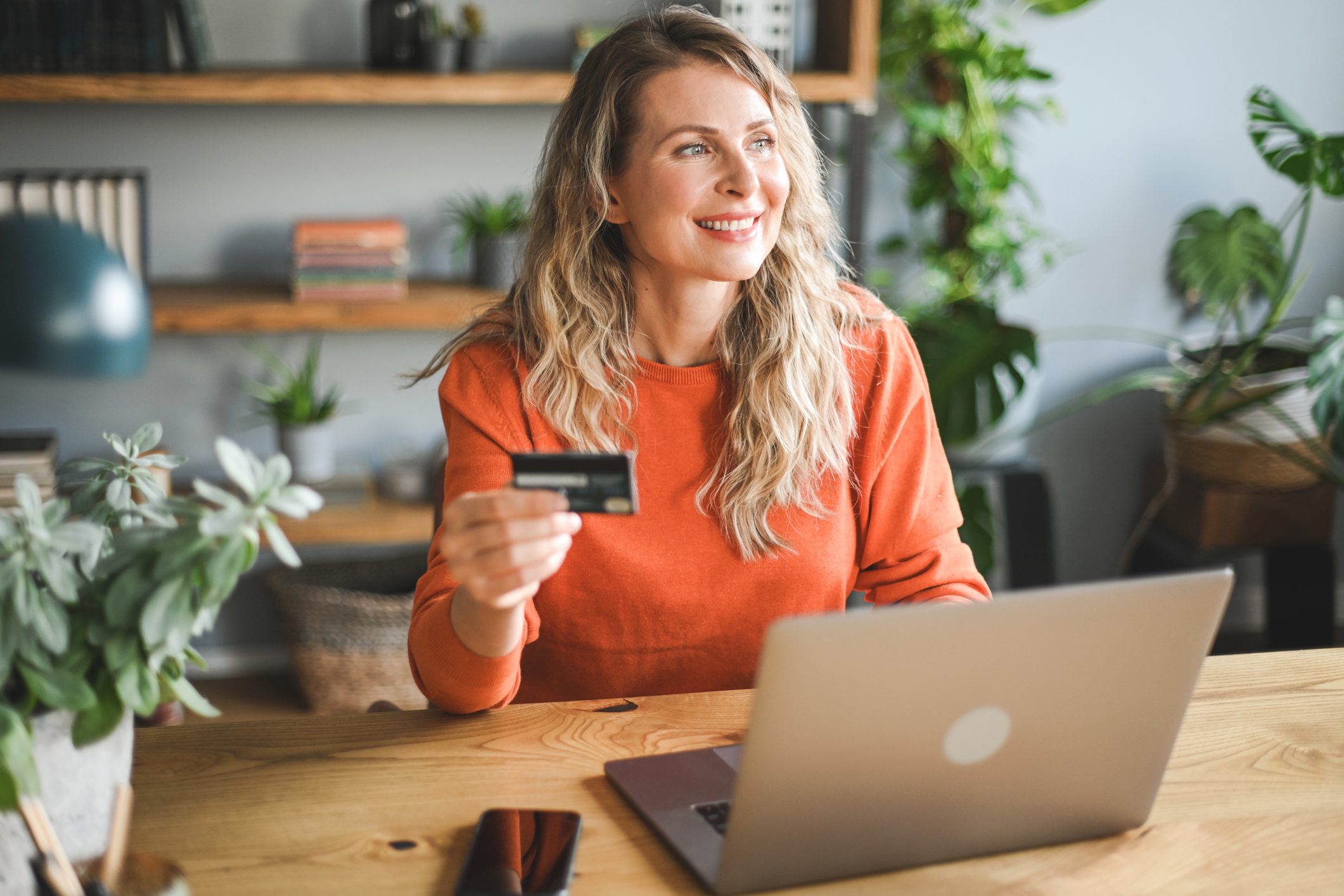 Woman with bank card