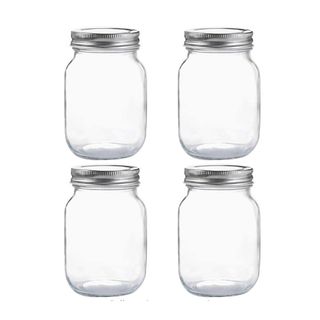 Four small glass storage jars